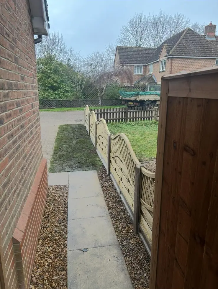 Decorative Wave Top Fencing Along Side Path